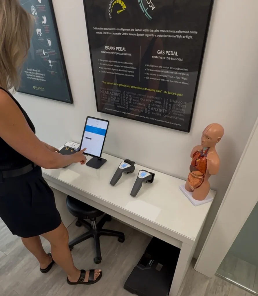 Chiropractic nervous system health testing tools and patient interaction.