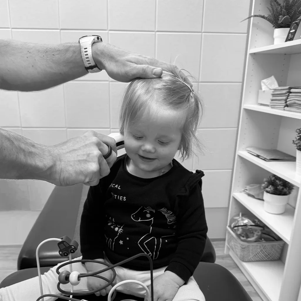 Child receiving a physical check